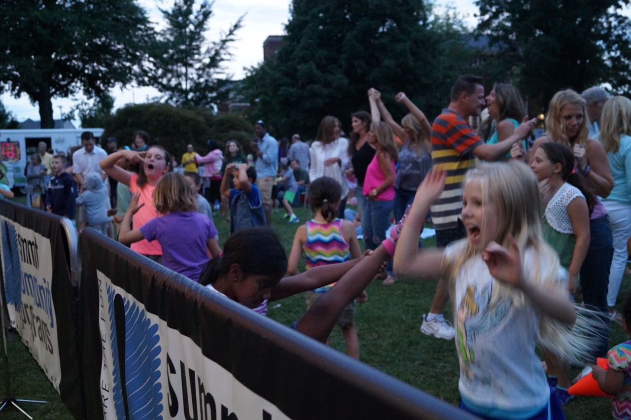 Kids dance to the band at the Brian Kirk and the Jirks - Hot Summer Nights event.